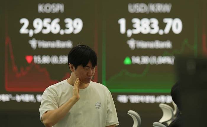 Asian shares decline after mixed Wall Street finish and tensions simmer in the Middle East
