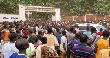 Crowd gathered outside Barthelemy Boganda High School following a stampede.