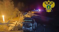 Rescue workers at the site of a train derailment in Bryansk, Russia.