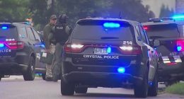 Police cars at a shelter-in-place scene.