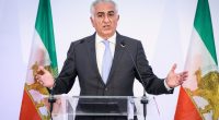 Reza Pahlavi giving a press conference.