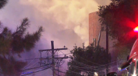 Blaze erupts at industrial site in Sydney's inner west
