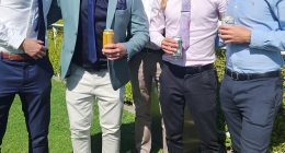 Bradley Turner (second from the left) was scammed out of nearly $17,000