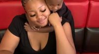 Woman holding her child.