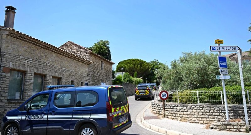 French gendarmes secure a perimeter following a fatal shooting.
