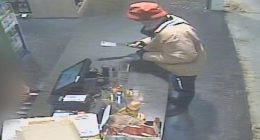 The man can be seen entering a store ï»¿on Dohles Rocks Road in Murrumba Downs armed with a meat cleaver at 7.30pm on June 7.