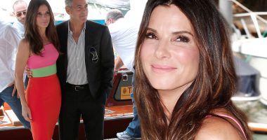 Can't hide their smiles! Sandra Bullock and George Clooney dazzle on the first day of Venice Film Festival