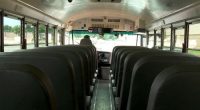 Care provider apologises after student left on locked bus at Adelaide depot