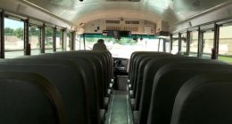 Care provider apologises after student left on locked bus at Adelaide depot
