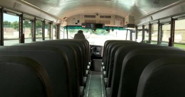Care provider apologises after student left on locked bus at Adelaide depot