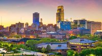 Omaha, Nebraska downtown skyline at dusk.