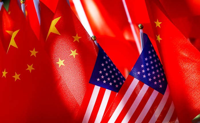 China blasts US for its computer chip moves and for threatening student visas