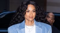 Ciara, 39, puts on a leggy display in black leather miniskirt