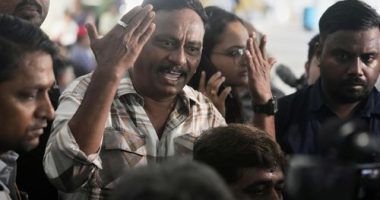 Death toll in Indian plane crash climbs as authorities race to identify victims