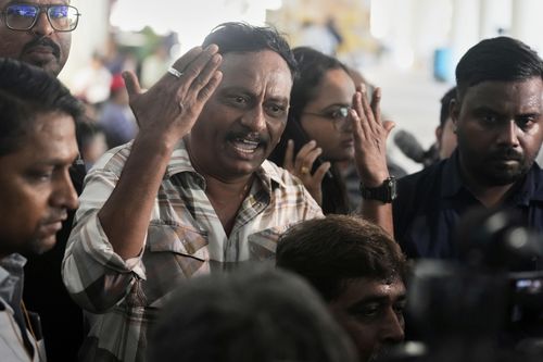Death toll in Indian plane crash climbs as authorities race to identify victims