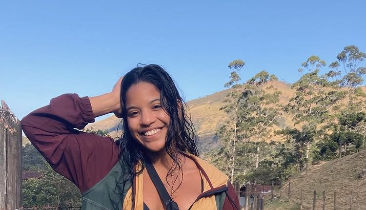 Juliana Marins, missing backpacker, smiling outdoors.