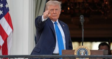President Donald Trump speaking and gesturing.