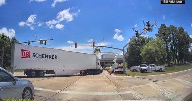 Dramatic dashcam video shows truck crash injure worker, left dangling over I-12 in Denham Springs, Louisiana