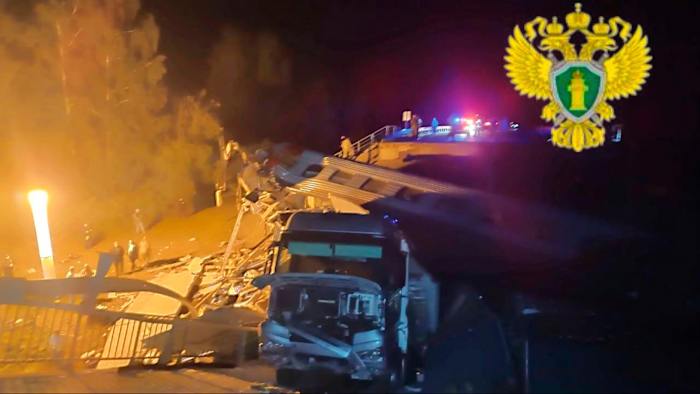Explosions caused 2 bridges in western Russia to collapse, officials say. 7 people were killed