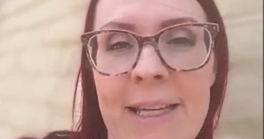 Woman reporting on homes damaged by a social media trend.