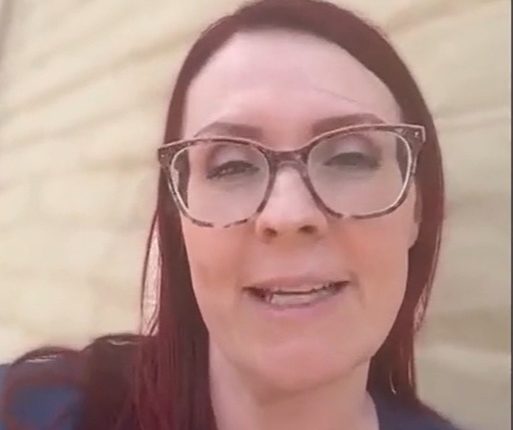 Woman reporting on homes damaged by a social media trend.