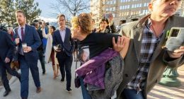 Chrystina Page, right, holds back Heather De Wolf, as she yells at Jon Hallford, left, the owner of Back to Nature Funeral Home, as he leaves with his lawyers following a preliminary hearing, Thursday, Feb. 8, 2024, outside the El Paso County Judicial Building in Colorado Springs, Colo