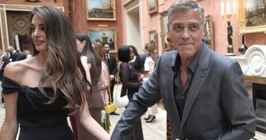 George Clooney and Amal chat with King Charles at Buckingham Palace
