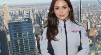 Laysa Peixoto in a NASA jacket overlooking New York City.