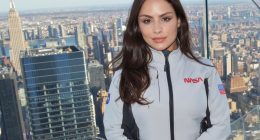 Laysa Peixoto in a NASA jacket overlooking New York City.
