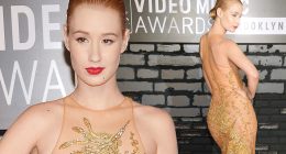 Golden wonder: Iggy Azalea wows on the red carpet in see-through gold dress at the VMAs