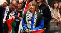 Greta Thunberg arriving at Stockholm airport after deportation from Israel.