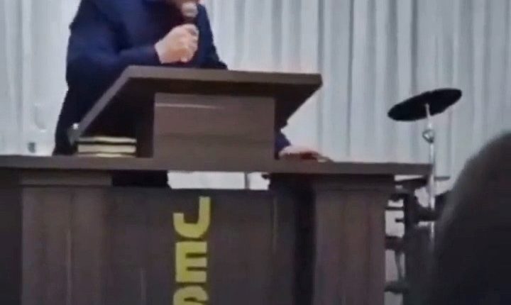 Pastor collapsing during a sermon.