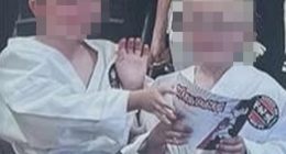 Image of Max and Sam Johnson in karate uniforms, faces blurred.