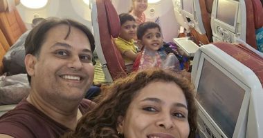 A doctor couple and their three young children