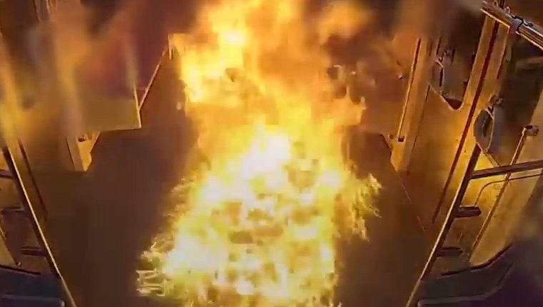 CCTV footage of a fire in a Seoul subway carriage.