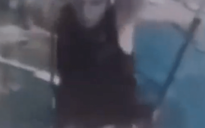 Blurry image of a person.