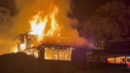 Housemates jump for their lives from burning Sydney home