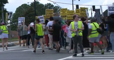 Hundreds march in "Hands Off" protest in Georgia