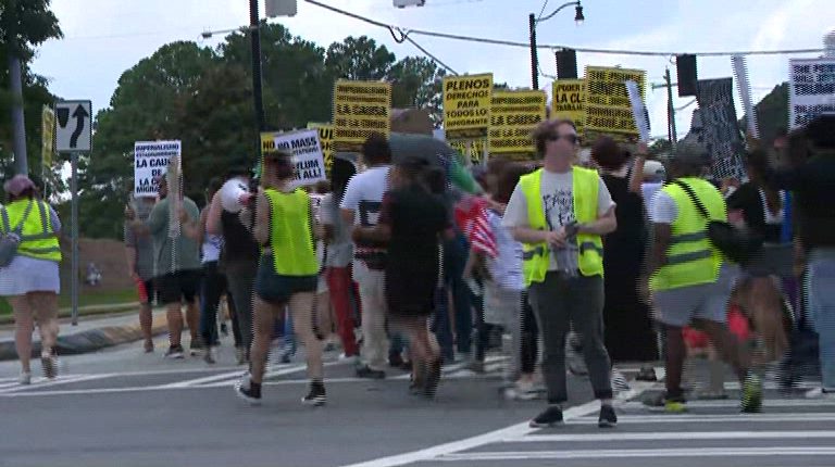 Hundreds march in "Hands Off" protest in Georgia