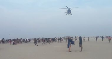 Hundreds of teenagers transform peaceful beach into chaos as police forced to break up fights