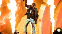 Travis Scott performing at a music festival.