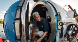 Stockton Rush, CEO of OceanGate, sitting inside a submersible.