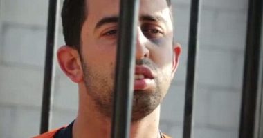 Lieutenant Muath al-Kasaesbeh, a Jordanian pilot, behind bars.