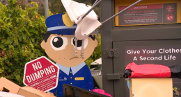Illegal dumping at a clothing donation bin.