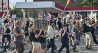 Innocent bystander gunned down at Utah protest as peacekeepers take aim at armed suspect