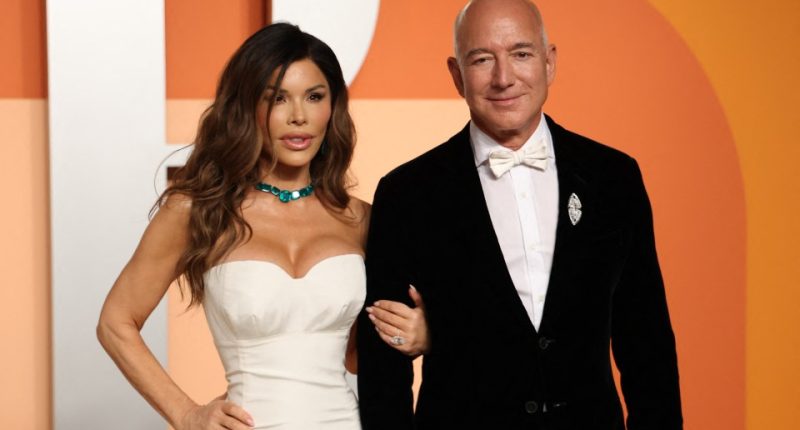 Jeff Bezos and Lauren Sanchez at an event.