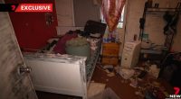 Messy bedroom with belongings strewn across the floor and bed.