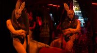 A dancer in a bunny mask at a Kharkiv nightclub.