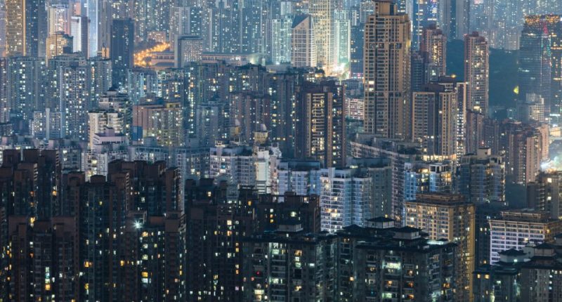 Night view of a densely populated residential district in China.