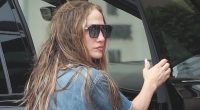 Jennifer Lopez suffers rare bad hair day while in baggy overalls